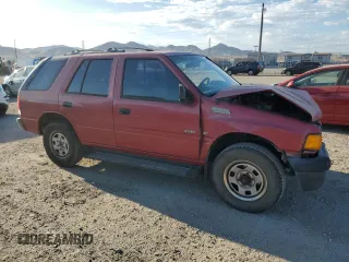 1997 Isuzu Rodeo z VIN 4S2CK58VXV4315798, wystawiony jako Copart lot #68860764 z przebiegiem 241 215 mil mil oraz Szkoda całkowita • Salvage title. Historia ofert i sprzedaży dostępna na DreamBid. Obrazek 4.