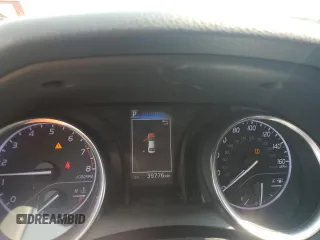2018 Toyota Camry LE с VIN 4T1B11HK1JU118582, выставлен на аукционе Copart как лот 57972895 с пробегом 39 776 миль миль и Списание • Salvage title. История ставок и продаж доступна на DreamBid. Изображение 9.