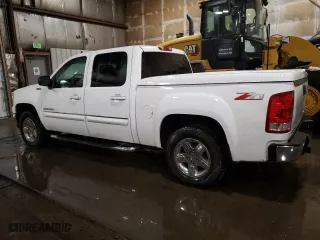 2013 GMC Sierra 1500 SLT with VIN 3GTP2WE76DG150052, listed as a Copart auction lot 48682575 with 105,384 mi miles and Clean Title. Bid and sale history available at carsss.com. Image 2.
