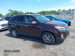2015 Kia Sorento LX z VIN 5XYKTCA60FG638823, wystawiony jako IAAI lot #42277546 z przebiegiem 147 444 mil mil oraz . Historia ofert i sprzedaży dostępna na DreamBid. Obrazek 13.