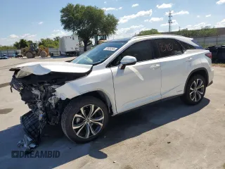 2020 Lexus RX with VIN 2T2HGMDA2LC050011, listed as a Copart auction lot 50695395 with 75,567 mi miles and Salvage Title. Bid and sale history available at carsss.com. Image 1.