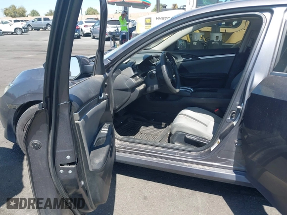 2018 Honda Civic LX with VIN 2HGFC2F57JH546731, listed as a IAAI auction lot 41979976 with 137,531 mi miles. Bid and sale history available at carsss.com. Image 5.