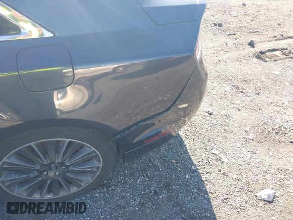 2014 Lincoln MKZ z VIN 3LN6L2J97ER835137, wystawiony jako IAAI lot #42062405 z przebiegiem 281 924 mil mil oraz . Historia ofert i sprzedaży dostępna na DreamBid. Obrazek 6.