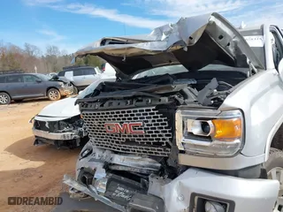2017 GMC Sierra 2500HD Denali with VIN 1GT12UEY8HF216479, listed as a IAAI auction lot 41678315 with 127,057 mi miles. Bid and sale history available at carsss.com. Image 6.