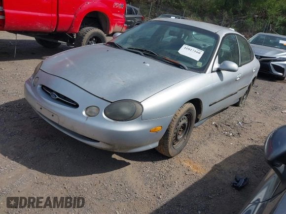 1999 Ford Taurus SE with VIN 1FAFP53U2XA322747, listed as a IAAI auction lot 41817160 with 230,319 mi miles. Bid and sale history available at carsss.com. Image 2.