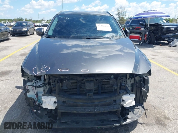 2020 Mazda CX-5 Touring with VIN JM3KFACM9L0826742, listed as a IAAI auction lot 41903755 with 73,409 mi miles and . Bid and sale history available at DreamBid. Image 13.