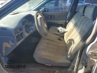 1994 Chevrolet Caprice z VIN 1G1BL52W4RR114969, wystawiony jako Copart lot #76950754 z przebiegiem Nie podano mil oraz Szkoda całkowita • Salvage title. Historia ofert i sprzedaży dostępna na DreamBid. Obrazek 7.