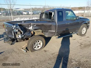 2011 Ford Ranger XLT with VIN 1FTLR4FEXBPB08276, listed as a IAAI auction lot 41559735 with 214,383 mi miles. Bid and sale history available at carsss.com. Image 4.