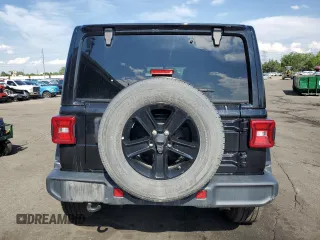 2020 Jeep Wrangler Unlimited Sahara with VIN 1C4HJXEG0LW301545, listed as a Copart auction lot 59279085 with 94,890 mi miles and Salvage title. Bid and sale history available at DreamBid. Image 6.