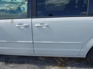 2014 Dodge Grand Caravan SXT with VIN 2C4RDGCGXER322705, listed as a IAAI auction lot 42170301 with 147,070 mi miles and . Bid and sale history available at DreamBid. Image 12.