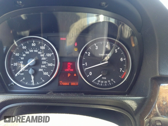 2008 BMW 3 Series 328i with VIN WBAVA37588NL53989, listed as a IAAI auction lot 38807371 with 179,844 mi miles. Bid and sale history available at carsss.com. Image 7.