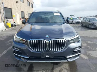 2021 BMW X5 xDrive45e with VIN 5UXTA6C09M9D26035, listed as a IAAI auction lot 41788981 with 60,571 mi miles and . Bid and sale history available at DreamBid. Image 12.