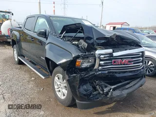2019 GMC Canyon 4WD SLE z VIN 1GTG6CEN2K1354585, wystawiony jako IAAI lot #42014158 z przebiegiem 34 269 mil mil oraz . Historia ofert i sprzedaży dostępna na DreamBid. Obrazek 6.