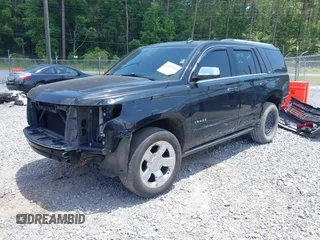 2015 Chevrolet Tahoe LTZ z VIN 1GNSCCKC8FR121461, wystawiony jako IAAI lot #42407901 z przebiegiem 137 729 mil mil oraz . Historia ofert i sprzedaży dostępna na DreamBid. Obrazek 18.