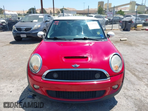 2009 MINI Hardtop S with VIN WMWMF73529TW84638, listed as a IAAI auction lot 42565544 with 60,721 mi miles and . Bid and sale history available at DreamBid. Image 13.