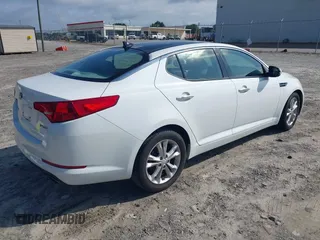 2013 Kia Optima EX with VIN 5XXGN4A79DG105157, listed as a IAAI auction lot 42496945 with 119,000 mi miles and . Bid and sale history available at DreamBid. Image 4.