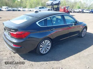 2014 BMW 5 Series GT 535i Gran Turismo xDrive with VIN WBA5M4C56ED183815, listed as a IAAI auction lot 42155348 with 150,357 mi miles and . Bid and sale history available at carsss.com. Image 4.