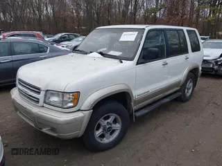 2002 Isuzu Trooper S with VIN JACDJ58X227J02390, listed as a IAAI auction lot 41125455 with 177,350 mi miles and . Bid and sale history available at DreamBid. Image 2.