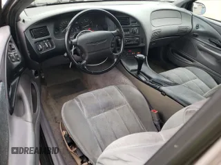 1995 Ford Thunderbird LX with VIN 1FALP62W45H169199, listed as a Copart auction lot 65458964 with 111,726 mi miles and Salvage Title. Bid and sale history available at DreamBid. Image 8.