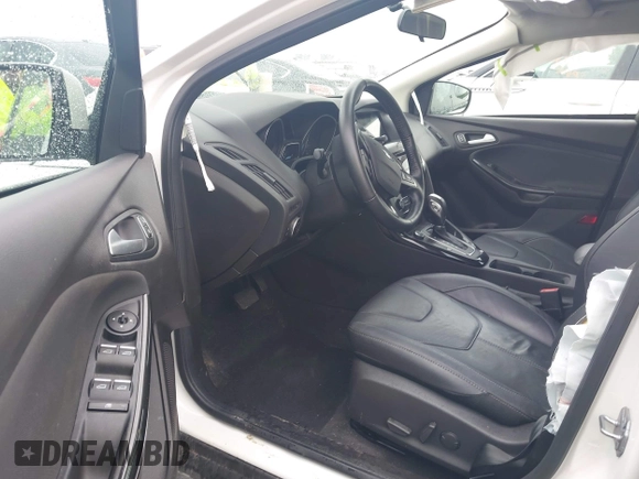 2016 Ford Focus Titanium с VIN 1FADP3N26GL387872, выставлен на аукционе IAAI как лот 42183397 с пробегом 30 557 миль миль и . История ставок и продаж доступна на DreamBid. Изображение 5.