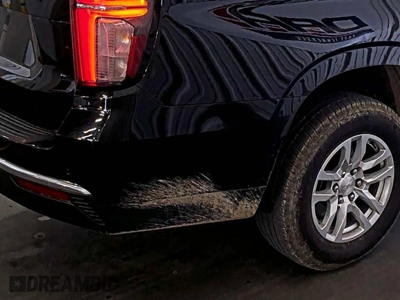 2022 Chevrolet Tahoe LS z VIN 1GNSKMKD7NR129745, wystawiony jako IAAI lot #42566236 z przebiegiem 95 126 mil mil oraz . Historia ofert i sprzedaży dostępna na DreamBid. Obrazek 28.