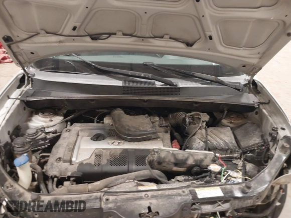 2006 Hyundai Tucson GL with VIN KM8JM12BX6U250937, listed as a IAAI auction lot 41529567 with 165,528 mi miles. Bid and sale history available at carsss.com. Image 10.