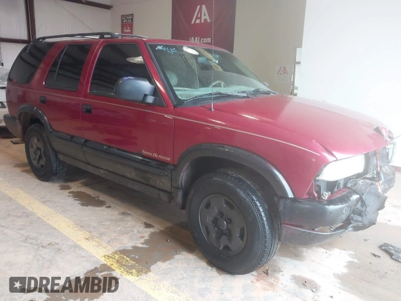 1999 Chevrolet Blazer Trailblazer z VIN 1GNDT13W4X2187490, wystawiony jako IAAI lot #41966073 z przebiegiem 187 604 mil mil oraz . Historia ofert i sprzedaży dostępna na DreamBid. Obrazek 1.