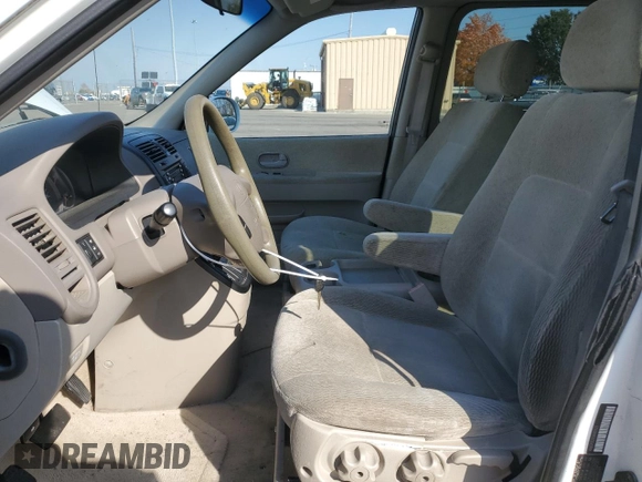 2005 Kia Sedona LX with VIN KNDUP132056685525, listed as a Copart auction lot 77790354 with 60,985 mi miles and Salvage Title. Bid and sale history available at carsss.com. Image 7.