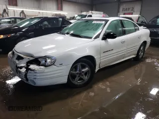 2002 Pontiac Grand Am SE1 with VIN 1G2NF52E92C309398, listed as a Copart auction lot 87854945 with 57,468 mi miles and Salvage Title. Bid and sale history available at carsss.com. Image 1.