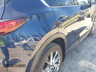 2019 Mazda CX-5 Signature with VIN JM3KFBEY7K0589236, listed as a IAAI auction lot 42078418 with 86,959 mi miles. Bid and sale history available at carsss.com. Image 6.