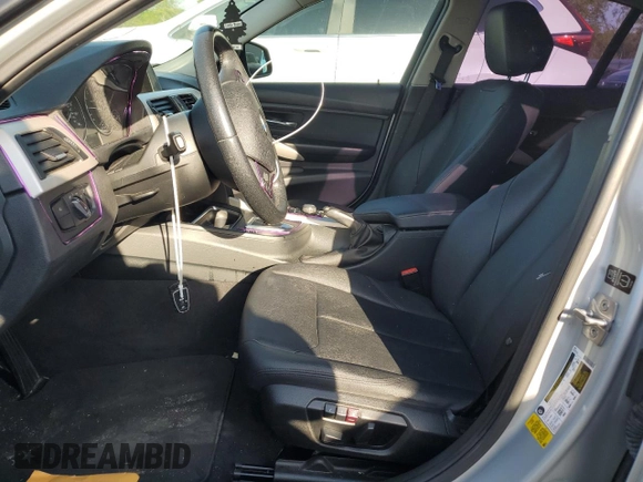 2014 BMW 3 Series 320i with VIN WBA3B1C56EK135528, listed as a Copart auction lot 53075575 with 131,341 mi miles and Salvage Title. Bid and sale history available at carsss.com. Image 7.