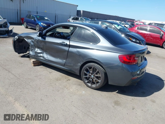 2014 BMW 2 Series M235i with VIN WBA1J7C51EVX33702, listed as a IAAI auction lot 41713337 with 83,076 mi miles. Bid and sale history available at carsss.com. Image 3.
