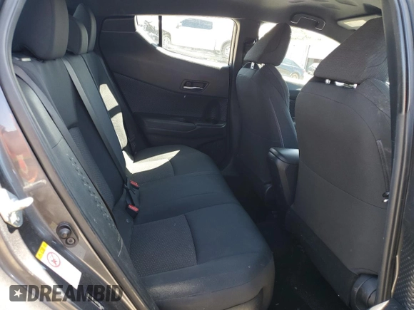 2018 Toyota C-HR XLE z VIN NMTKHMBXXJR046516, wystawiony jako Copart lot #53486395 z przebiegiem 95 741 mil mil oraz Czysty tytuł • Clean title. Historia ofert i sprzedaży dostępna na DreamBid. Obrazek 10.