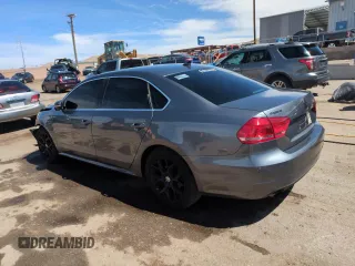 2015 Volkswagen Passat SE with VIN 1VWBS7A35FC014128, listed as a Copart auction lot 51010485 with 154,263 mi miles and Salvage title. Bid and sale history available at DreamBid. Image 2.