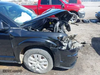 2017 Dodge Journey SE with VIN 3C4PDCAB2HT698940, listed as a IAAI auction lot 41843176 with 141,499 mi miles. Bid and sale history available at carsss.com. Image 18.