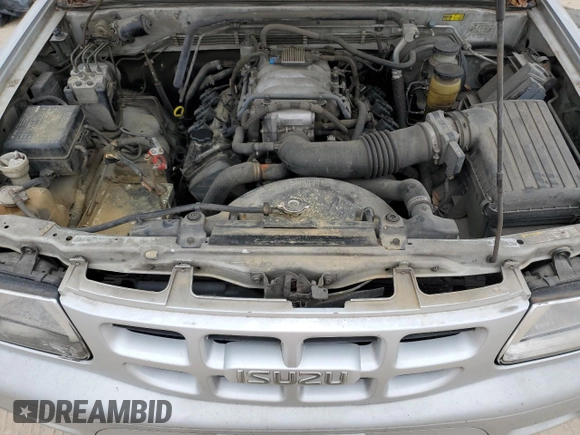 2000 Isuzu Rodeo S with VIN 4S2CK58W8Y4351180, listed as a Copart auction lot 44648595 with 375,829 mi miles and Salvage title. Bid and sale history available at DreamBid. Image 13.