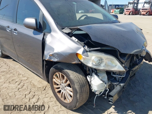 2012 Toyota Sienna XLE AAS with VIN 5TDYK3DC1CS186331, listed as a IAAI auction lot 41545031 with 240,788 mi miles and . Bid and sale history available at DreamBid. Image 6.