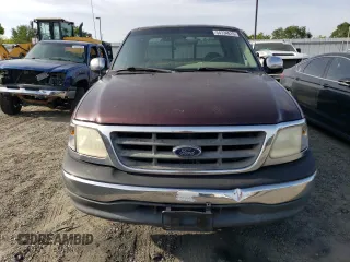 2000 Ford F-150 with VIN 1FTRX17W5YKA50203, listed as a Copart auction lot 54734615 with Not Provided miles and Salvage Title. Bid and sale history available at DreamBid. Image 5.