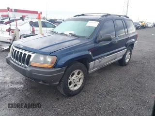 2000 Jeep Grand Cherokee Laredo with VIN 1J4G248S4YC144404, listed as a IAAI auction lot 42114635 with 181,854 mi miles and . Bid and sale history available at DreamBid. Image 2.