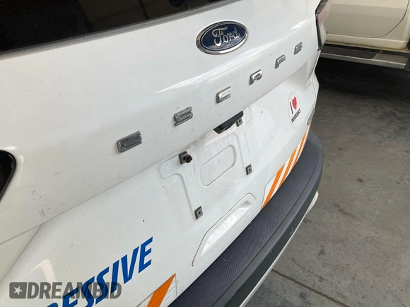 2020 Ford Escape SE z VIN 1FMCU0G62LUB45075, wystawiony jako IAAI lot #42743374 z przebiegiem 84 675 mil mil oraz . Historia ofert i sprzedaży dostępna na DreamBid. Obrazek 25.