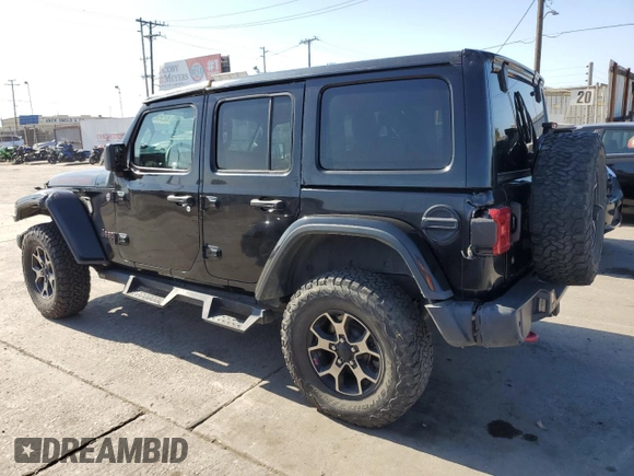 2018 Jeep Wrangler Unlimited Rubicon with VIN 1C4HJXFGXJW255881, listed as a Copart auction lot 62958975 with 39,439 mi miles and Salvage title. Bid and sale history available at DreamBid. Image 2.