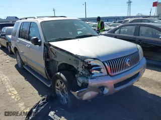 2003 Mercury Mountaineer Convenience with VIN 4M2ZU86K73UJ14054, listed as a IAAI auction lot 41649332 with 210,772 mi miles. Bid and sale history available at carsss.com. Image 1.