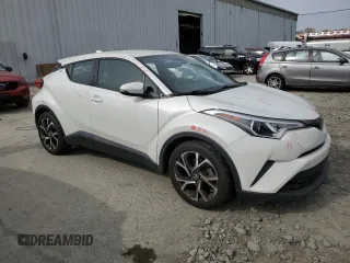 2019 Toyota C-HR XLE z VIN NMTKHMBX7KR073500, wystawiony jako Copart lot #53596395 z przebiegiem 91 934 mil mil oraz Szkoda całkowita • Salvage title. Historia ofert i sprzedaży dostępna na DreamBid. Obrazek 4.