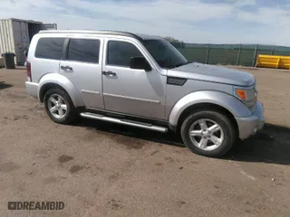 2007 Dodge Nitro SLT with VIN 1D8GU58K07W565458, listed as a IAAI auction lot 41793488 with 186,728 mi miles. Bid and sale history available at carsss.com. Image 1.