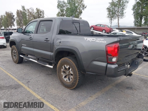 2018 Toyota Tacoma SR5 with VIN 3TMAZ5CN1JM071396, listed as a IAAI auction lot 42061640 with 122,148 mi miles and . Bid and sale history available at DreamBid. Image 3.