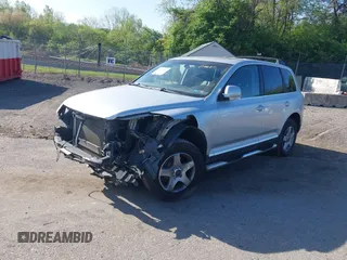 2005 Volkswagen Touareg 3.2L V6 with VIN WVGZG77L75D076211, listed as a IAAI auction lot 42143669 with 158,586 mi miles and . Bid and sale history available at DreamBid. Image 2.
