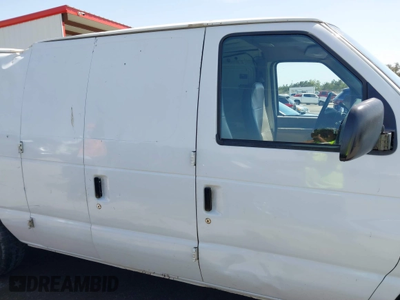 1998 Ford Econoline Cargo with VIN 1FTRE1420WHB15038, listed as a IAAI auction lot 41826051 with 338,809 mi miles. Bid and sale history available at carsss.com. Image 13.