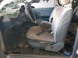 1992 Toyota Pickup DLX z VIN JT4VN13D0N5078994, wystawiony jako Copart lot #65777924 z przebiegiem 286 288 mil mil oraz Szkoda całkowita • Salvage title. Historia ofert i sprzedaży dostępna na DreamBid. Obrazek 7.