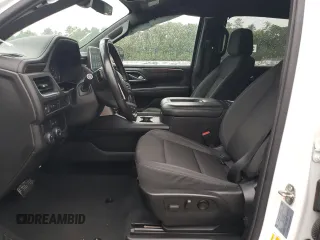 2021 Chevrolet Suburban LS with VIN 1GNSCBKD5MR392512, listed as a Copart auction lot 71238124 with 77,775 mi miles and Salvage Title. Bid and sale history available at DreamBid. Image 7.