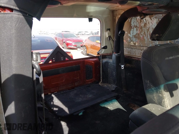 2014 Jeep Wrangler Rubicon with VIN 1C4BJWCG8EL185597, listed as a IAAI auction lot 41914489 with 85,545 mi miles and . Bid and sale history available at DreamBid. Image 8.